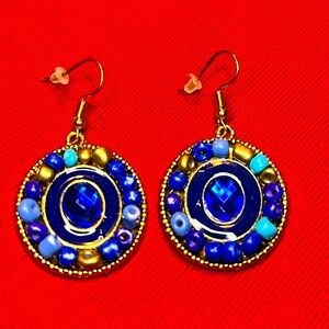 Set of beautiful blue earrings they made out of small beats amazing blue stone